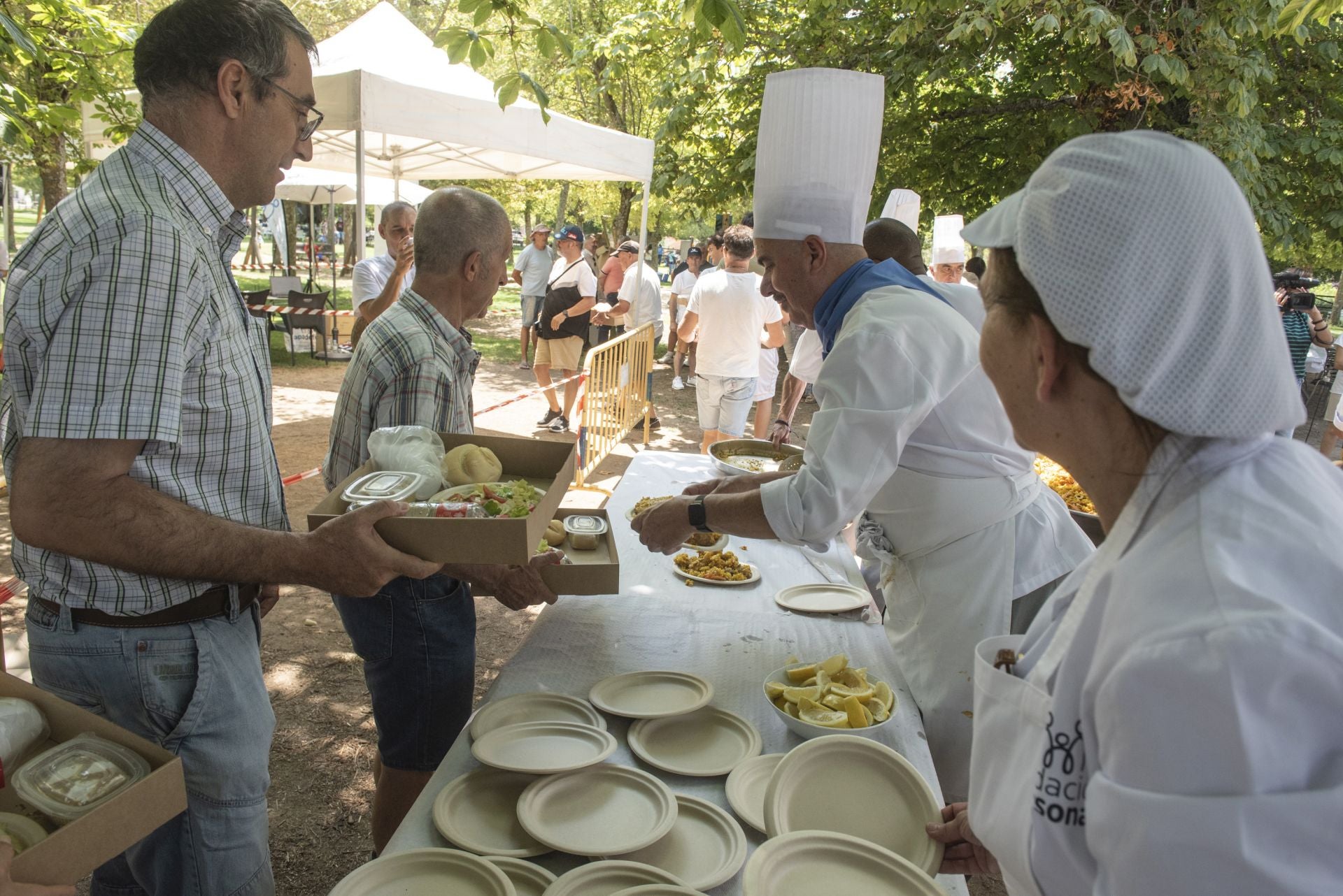 La paella popular de Apadefim, en imágenes