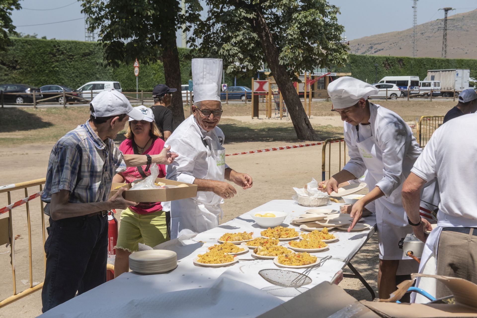 La paella popular de Apadefim, en imágenes