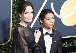 Angelina Jolie con su hijo Pax, antes de que sufriera el accidente.