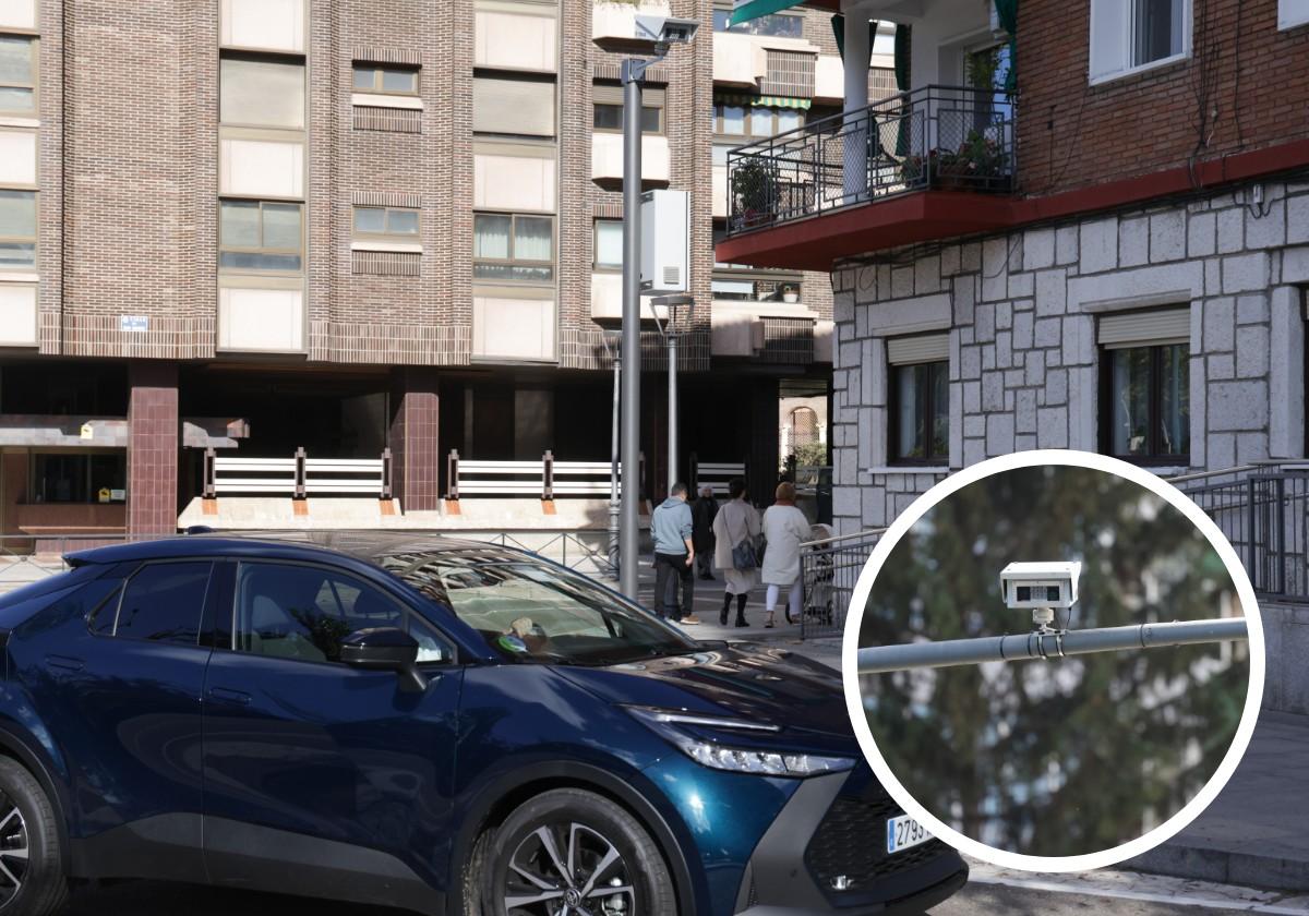 Un coche con pegatina medioambiental circula delante de una de las cámaras que controlarán la ZBE, en la calle San Agustín