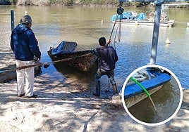 Los voluntarios de los Amigos del Pisuerga sacan la barca de la Virgen del Carmen.