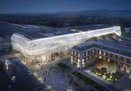 Infografía de la futura estación de trenes de Valladolid iluminada por la noche.