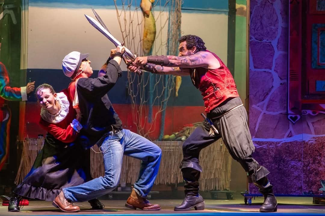 Brutus y Popeye se pelean por Olivia.