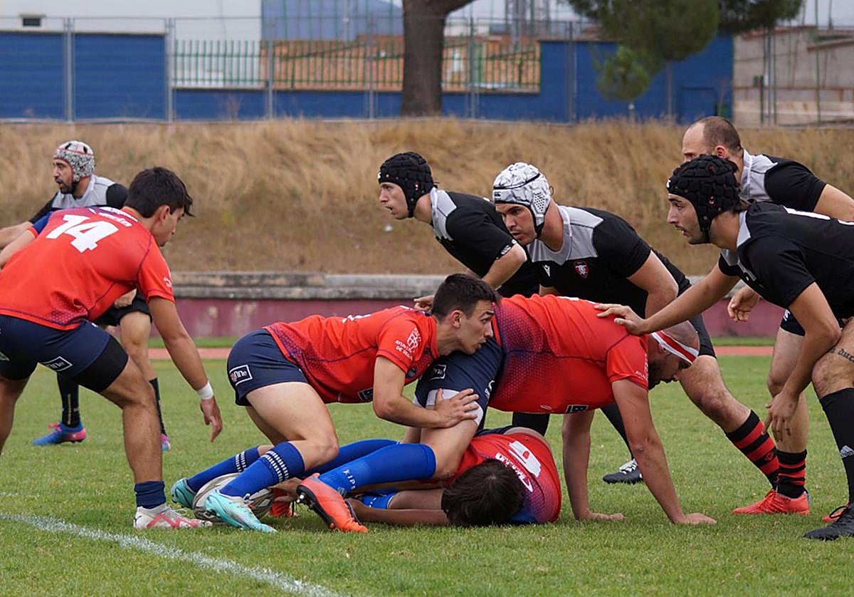 Un momento del encuentro del debut del Lobos en la Primera Madrileña.