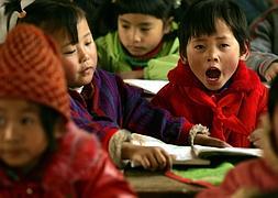 Alumnos chinos en una escuela de Zhongjunlou, en la provincia rural de Anhui. / Afp