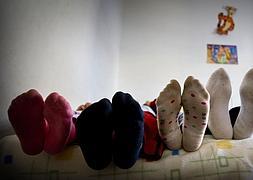 Varios niños, en la habitación de su casa. / Óscar chamorro | Europa Press