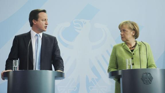 David Cameron y Angela Merkel. 
