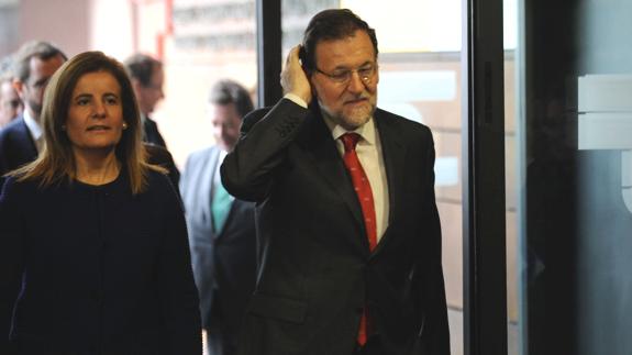 Mariano Rajoy junto a Fátiba Báñez.
