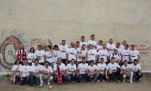 Jugadores, técnicos y directivos del Nava durante la celebración. / Fernando de la Calle