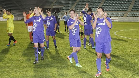 Los jugadores del Cristo, al término del partido ante el Deportivo. 