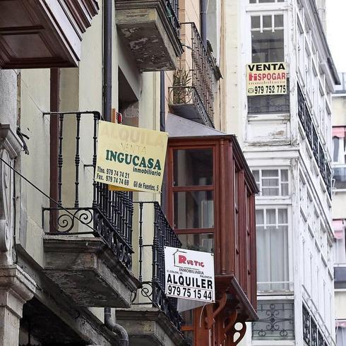 Carteles de venta y alquiler de viviendas en Palencia