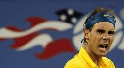 El tenista español Rafael Nadal celebra uno de los puntos ante el francés Monfils. / EMMANUEL DUNAND-AFP