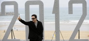Emmerich y Cusack presentan '2012' a la sombra del festival