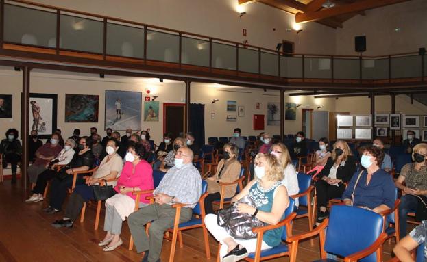 Imagen principal - Asistentes al concierto. 