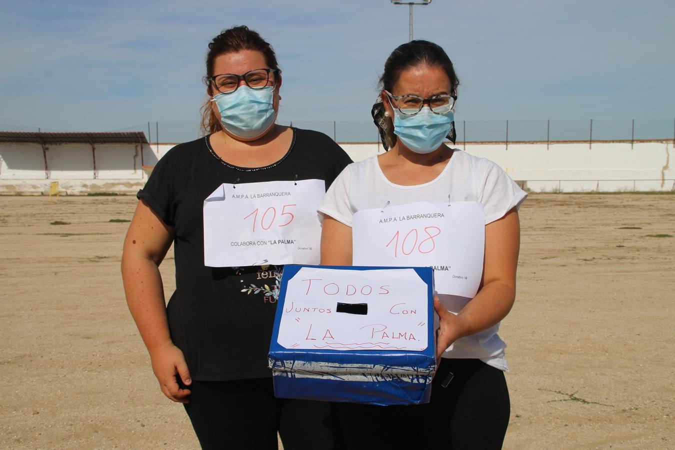 Participantes en la carrera solidaria por los afectados por el volcán canario. 