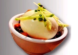 'Huevo poché sobre puré de patata frita y morcilla', la tapa ganadora de la feria jaraiceña.