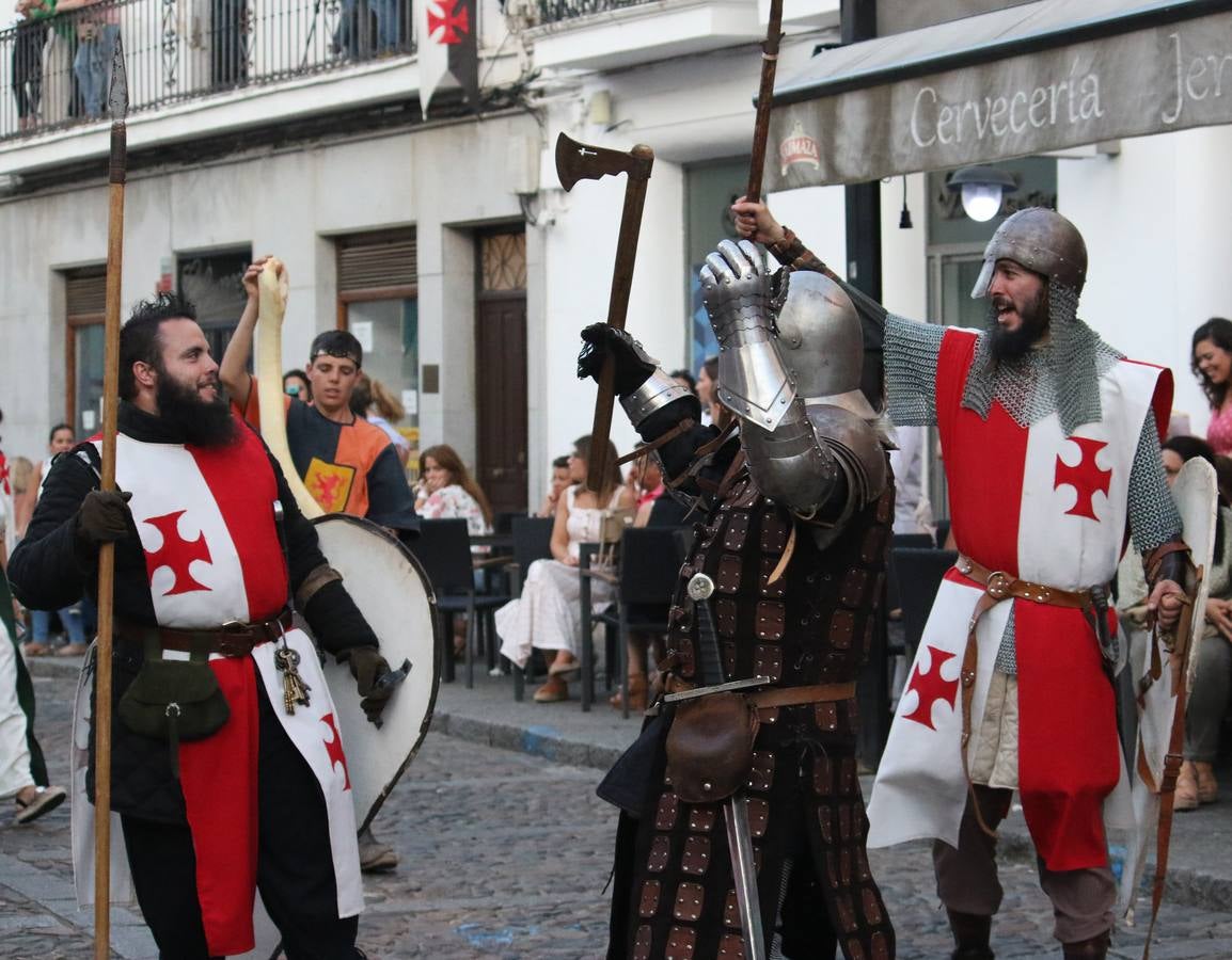Escena de animación de calle en la fortaleza templaria.