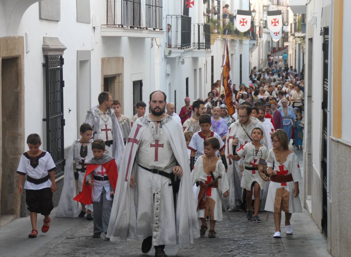 Escena de animación de calle en la fortaleza templaria.