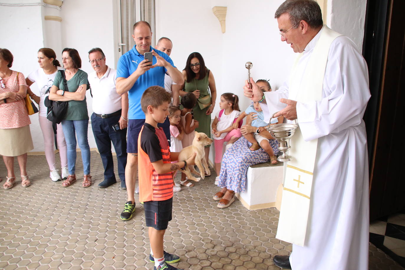 Fotos: La «velá» del barrio de San Roque continúa con la tradicional bendición de animales y los juegos infantiles