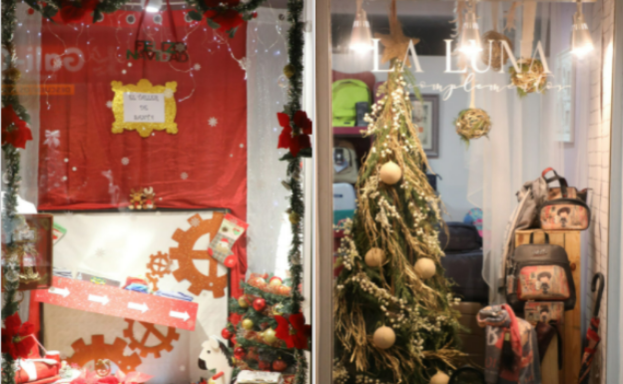 Escaparates navideños de 'Colores, Moda Infantil', ganador del premio del público (izquierda), y 'La Luna Complementos' (derecha), vencedor del premio del jurado