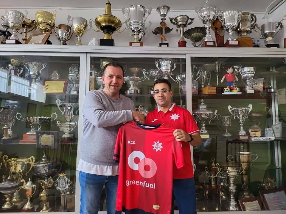 Presentación junto al presidente en la sala de juntas