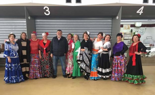 Los comerciantes de los puestos del Mercado Municipal han conmemorado el Día Internacional de la Mujer