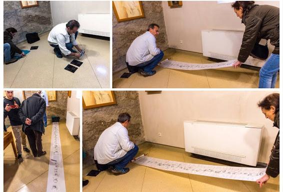 Rollo de papel continuo de 17 m x 30,7 cm con el texto de la reivindicación y firmas 