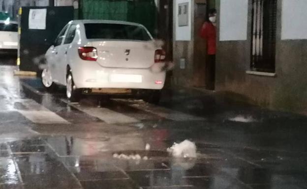 Imagen principal - Las calles de Malpartida anegadas de agua. 