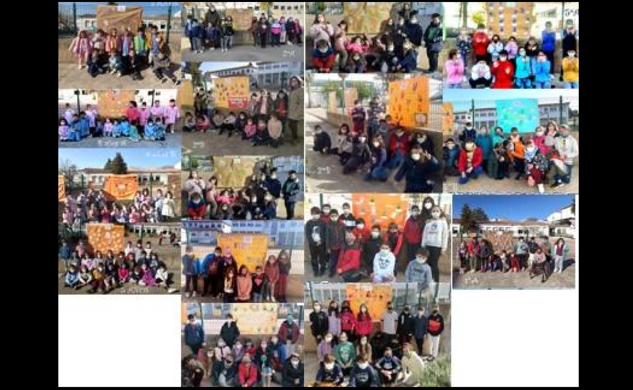 Los distitintos cursos del CEIP Los Arcos ante su mural del Día de la Paz. 