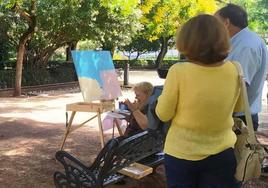 El ganador con los organizadores del certamen