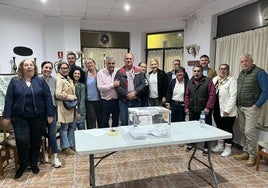 El nuevo secretario general, a la derecha