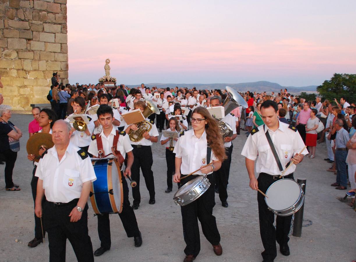 La banda de música de Trujillo 'Antonio Flores' en la procesión de la bajada a la patrona a San Martín 
