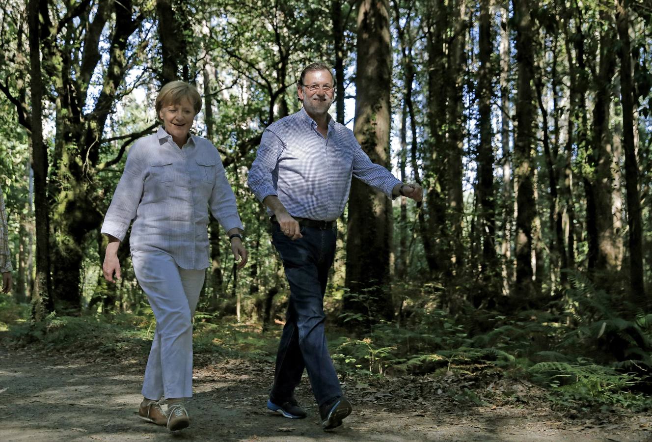 Angela Merkel y Mariano Rajoy recorren parte del Camino de Santiago.