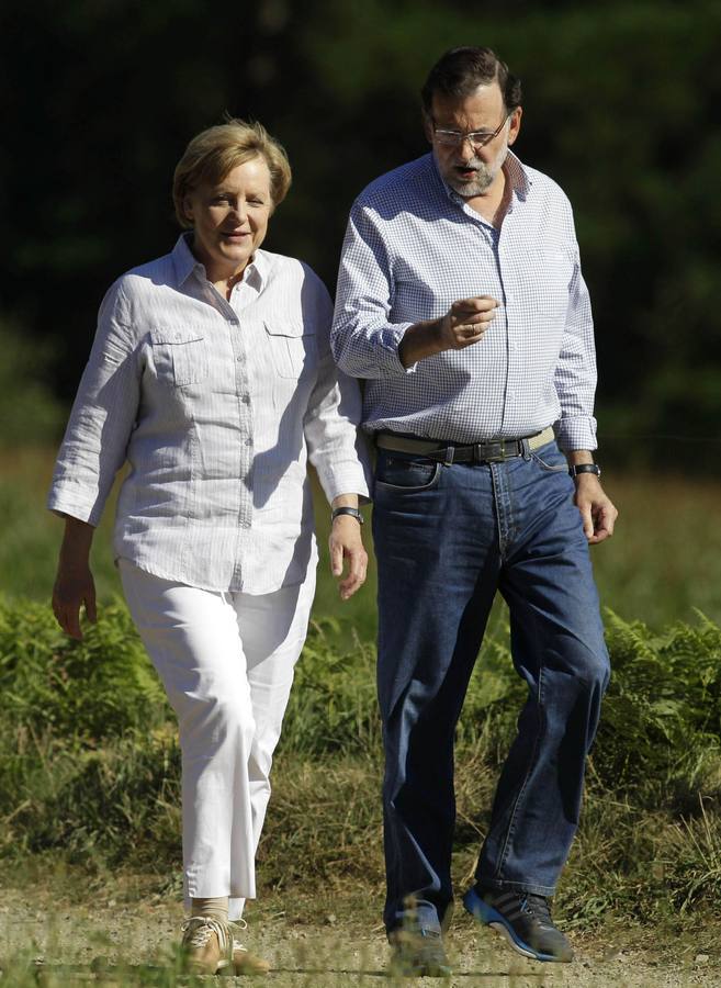 Angela Merkel y Mariano Rajoy recorren parte del Camino de Santiago.