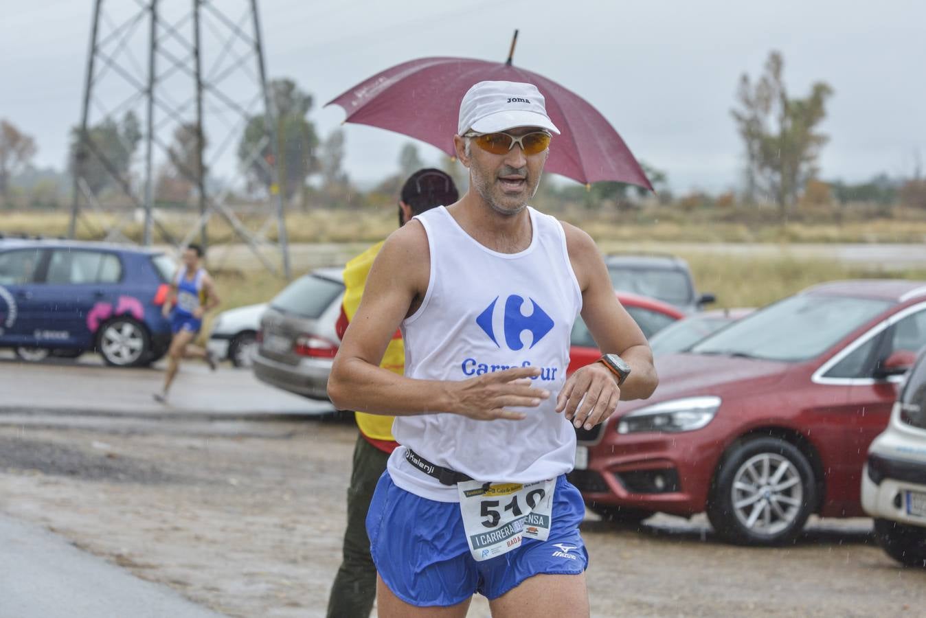 Búscate en las fotos de la I carrera de la prensa de Badajoz