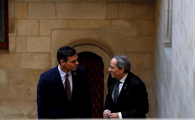 Pedro Sánchez, presidente del Gobierno, junto a Quim Torra, president de la Generalitat 