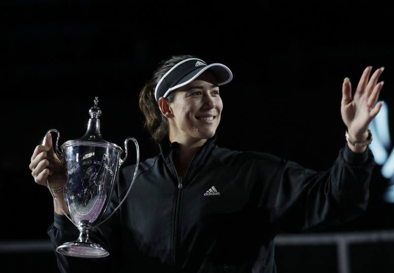 Garbiñe Muguruza celebra el triunfo de maestra. 