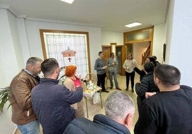 Imagen secundaria 1 - Arriba una de las ponencias y debajo el 'Coffe Break'. 