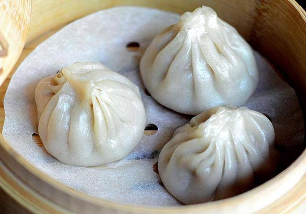 Shanghai Xialongbao, dim sum al vapor con relleno caldoso de cerdo de El Bund, Madrid.