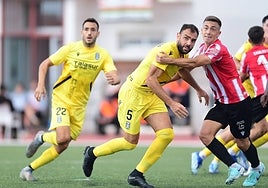 Ramiro marca al central cartagenero Verdú.