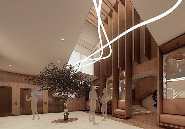 Una encina bajo un juego de luces en la recepción.