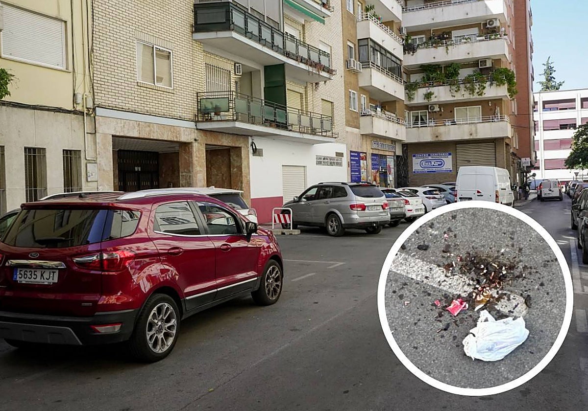 La calle donde se producen los incidentes y el detalle de una botella rota.