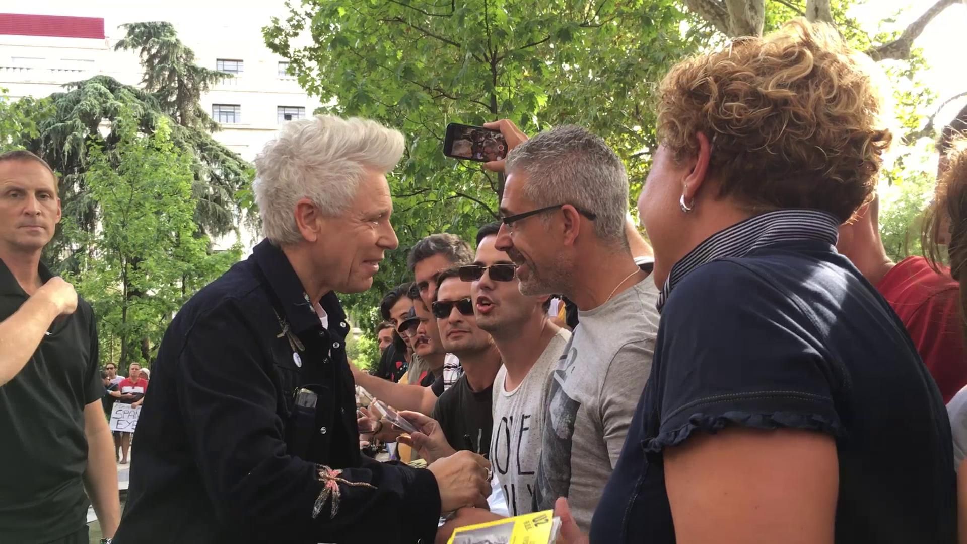 Con Adam Clayton, de U2.