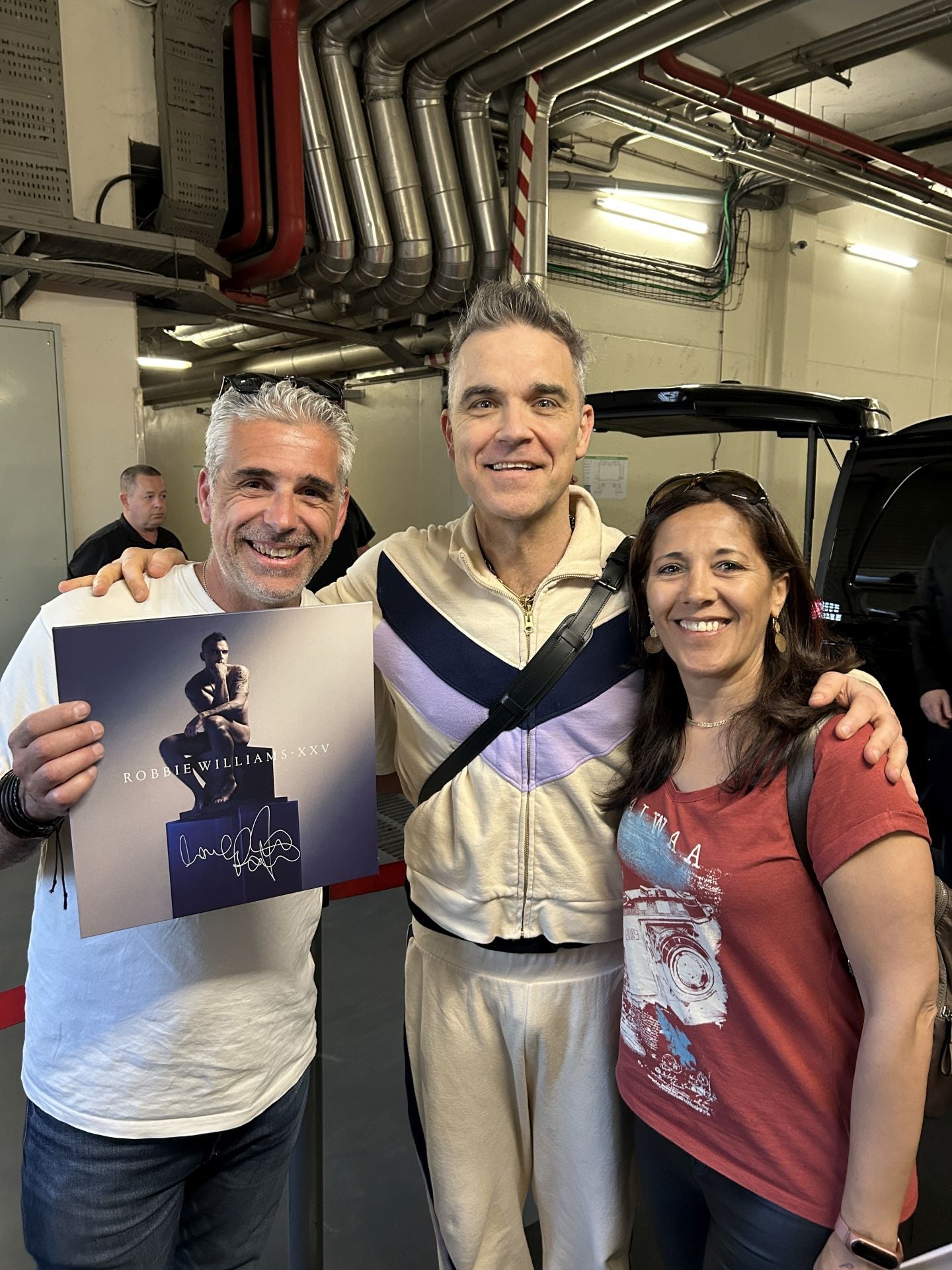 Con Robbie Williams.