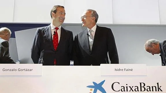 El consejero delegado de CaixaBank, Gonzalo Gortázar, y el presidente de la entidad, Isidre Fainé.