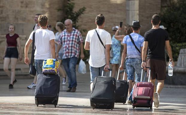 Un grupo de turistas en Valencia. 