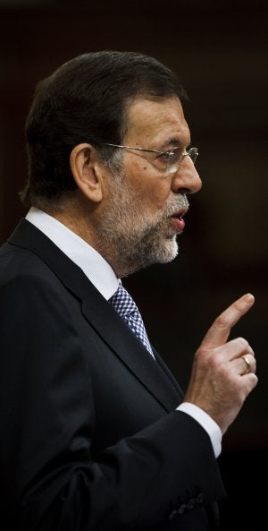 Mariano Rajoy se dirige a los diputados. ::
DANIEL OCHOA DE OLZA / AP