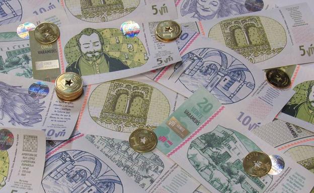 Billetes y monedas de varamedí 