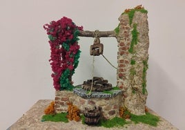Uno de los elementos, un pozo, elaborados en un taller