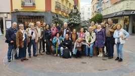 Integrantes de Anduxar en el Monumento a la Jamuga.